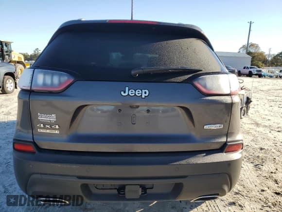 ✅ 2021 Jeep Cherokee 80th Anniversary • VIN: 1C4PJMMX2MD141631 • Lot: 90995015. Listed on Copart with 102,607 mi. Free auction sales archive from the USA and detailed vehicle history report at DreamBid. Image 6.