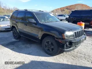 ✅ 2007 Jeep Grand Cherokee Overland • VIN: 1J8HR68277C601487 • Lot: 43606710. Listed on IAAI with 245,137 mi. Free auction sales archive from the USA and detailed vehicle history report at DreamBid. Image 1.