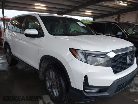✅ 2023 Honda Passport EX-L • VIN: 5FNYF8H5XPB023040 • Lot: 41904058. Listed on IAAI with 69,834 mi. Free auction sales archive from the USA and detailed vehicle history report at DreamBid. Image 1.