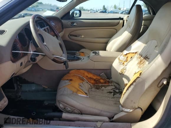 ✅ 1998 Jaguar XK • VIN: SAJGX2245WC027810 • Лот: 70329715. Опубликован ранее на Copart с пробегом Не указан. Бесплатный доступ к архиву аукционных продаж из США и подробный отчёт об истории автомобиля на DreamBid. Изображение 7.