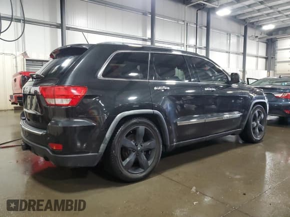 ✅ 2012 Jeep Grand Cherokee Overland • VIN: 1C4RJFCG0CC200346 • Lot: 85882075. Listed on Copart with 161,948 mi. Free auction sales archive from the USA and detailed vehicle history report at DreamBid. Image 3.