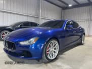 ✅ 2014 Maserati Ghibli S Q4 • VIN: ZAM57RTA0E1087454 • Lot: 84060514. Listed on Copart with 58,880 mi. Free auction sales archive from the USA and detailed vehicle history report at DreamBid. Image 2.