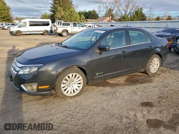 ✅ 2012 Ford Fusion Hybrid • VIN: 3FADP0L39CR309186 • Лот: 93355235. Опубликован ранее на Copart с пробегом 141 374 миль. Бесплатный доступ к архиву аукционных продаж из США и подробный отчёт об истории автомобиля на DreamBid. Изображение 1.