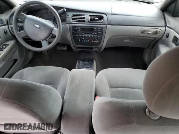 ✅ 2005 Ford Taurus SE • VIN: 1FAHP53U15A233371 • Лот: 52019685. Опубликован ранее на Copart с пробегом Не указан. Бесплатный доступ к архиву аукционных продаж из США и подробный отчёт об истории автомобиля на DreamBid. Изображение 8.