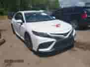 2022 Toyota Camry SE with VIN 4T1G11BKXNU067748, listed as a IAAI auction lot 42637849 with 73,909 mi miles and . Bid and sale history available at DreamBid. Image 1.