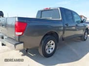 ✅ 2005 Nissan Titan XE • VIN: 1N6AA07A05N508637 • Lot: 42235504. Listed on IAAI with 203,932 mi. Free auction sales archive from the USA and detailed vehicle history report at DreamBid. Image 4.