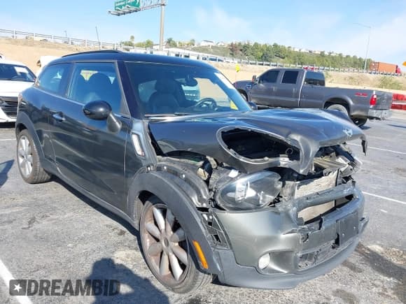 ✅ 2013 MINI Paceman S • VIN: WMWSS5C56DWN49161 • Lot: 41450692. Listed on IAAI with 87,969 mi. Free auction sales archive from the USA and detailed vehicle history report at DreamBid. Image 1.