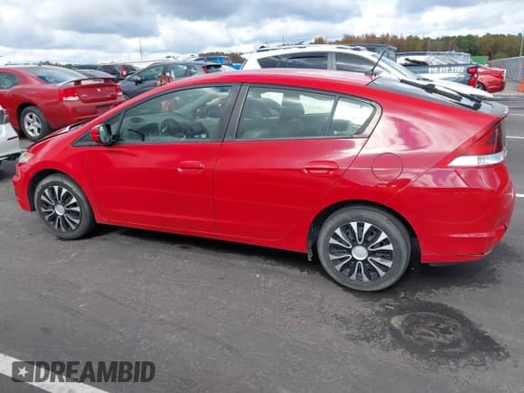 ✅ 2013 Honda Insight • VIN: JHMZE2H30DS003797 • Lot: 43580287. Listed on IAAI with 104,858 mi. Free auction sales archive from the USA and detailed vehicle history report at DreamBid. Image 14.