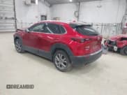 ✅ 2022 Mazda CX-30 S Premium • VIN: 3MVDMBDL0NM412458 • Lot: 43196761. Wystawiony na IAAI z przebiegiem 24 089 mil. Bezpłatny archiwum sprzedaży aukcyjnych z USA i szczegółowy raport historii pojazdu na DreamBid. Zdjęcie 3.