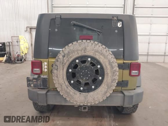 ✅ 2007 Jeep Wrangler X • VIN: 1J4GA391X7L157420 • Lot: 42940955. Listed on IAAI with 143,867 mi. Free auction sales archive from the USA and detailed vehicle history report at DreamBid. Image 17.