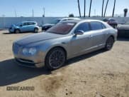 ✅ 2014 Bentley Flying Spur • VIN: SCBEC9ZA7EC090575 • Lot: 57110315. Listed on Copart with 19,083 mi. Free auction sales archive from the USA and detailed vehicle history report at DreamBid. Image 1.