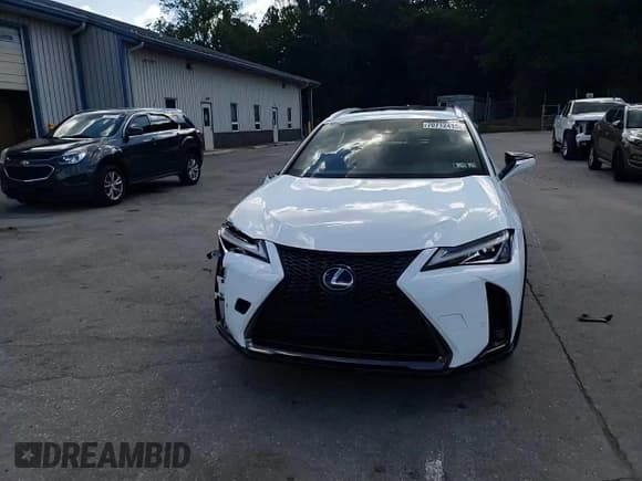 ✅ 2021 Lexus UX 250h F Sport • VIN: JTHR9JBHXM2046000 • Lot: 70712415. Wystawiony na Copart z przebiegiem 13 014 mil. Bezpłatny archiwum sprzedaży aukcyjnych z USA i szczegółowy raport historii pojazdu na DreamBid. Zdjęcie 14.