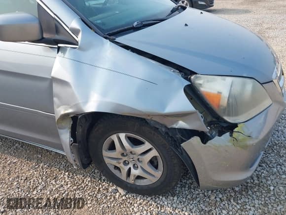 ✅ 2006 Honda Odyssey EX-L • VIN: 5FNRL38686B060773 • Lot: 43153855. Wystawiony na IAAI z przebiegiem 253 184 mil. Bezpłatny archiwum sprzedaży aukcyjnych z USA i szczegółowy raport historii pojazdu na DreamBid. Zdjęcie 6.