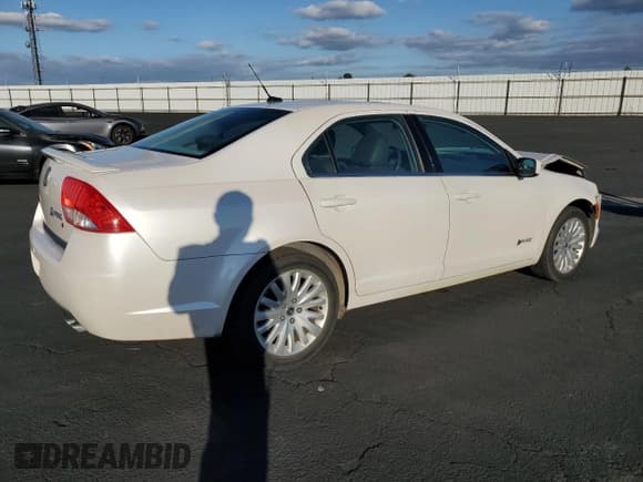 ✅ 2010 Mercury Milan Hybrid • VIN: 3MEDM0L38AR610546 • Lot: 91614175. Listed on Copart with 112,497 mi. Free auction sales archive from the USA and detailed vehicle history report at DreamBid. Image 3.