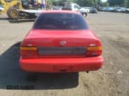 ✅ 1993 Toyota Corolla DLX • VIN: 1NXAE09E4PZ049706 • Lot: 62407364. Listed on Copart with 130,291 mi. Free auction sales archive from the USA and detailed vehicle history report at DreamBid. Image 6.