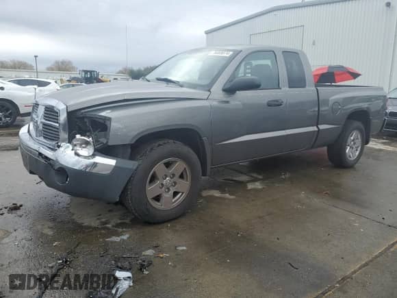 2005 Dodge Dakota SLT with VIN 1D7HE42N65S189095, listed as a Copart auction lot 78869074 with 121,993 mi miles and Salvage title. Bid and sale history available at DreamBid. Image 1.