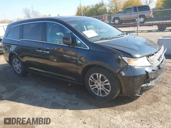 ✅ 2012 Honda Odyssey EX-L • VIN: 5FNRL5H60CB140575 • Lot: 43605156. Listed on IAAI with Not provided. Free auction sales archive from the USA and detailed vehicle history report at DreamBid. Image 1.