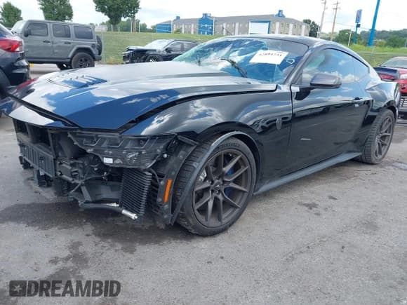 ✅ 2024 Ford Mustang Dark Horse • VIN: 1FA6P8R00R5505811 • Lot: 42894731. Listed on IAAI with 5,395 mi. Free auction sales archive from the USA and detailed vehicle history report at DreamBid. Image 2.