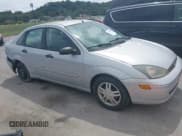 ✅ 2003 Ford Focus SE • VIN: 1FAFP34313W193911 • Lot: 43055034. Listed on IAAI with 121,258 mi. Free auction sales archive from the USA and detailed vehicle history report at DreamBid. Image 1.