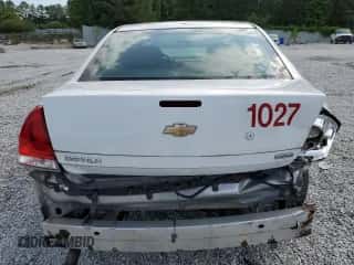 2015 Chevrolet Impala Police Police with VIN 2G1WD5E38F1159448, listed as a Copart auction lot 57712885 with 226,647 mi miles and Salvage title. Bid and sale history available at DreamBid. Image 6.