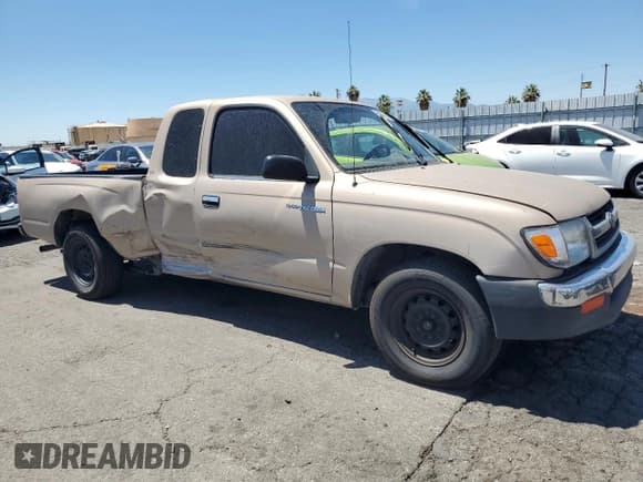✅ 1999 Toyota Tacoma • VIN: 4TAVL52N9XZ558532 • Lot: 65005205. Listed on Copart with 238,588 mi. Free auction sales archive from the USA and detailed vehicle history report at DreamBid. Image 4.