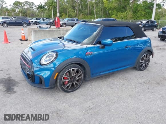 ✅ 2022 MINI Convertible John Cooper Works • VIN: WMW63DL0XN3P15732 • Lot: 41807134. Listed on IAAI with 52,631 mi. Free auction sales archive from the USA and detailed vehicle history report at DreamBid. Image 2.