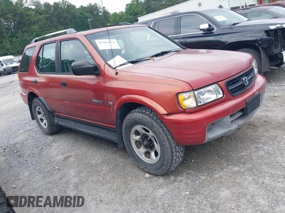 ✅ 2001 Honda Passport LX • VIN: 4S6CK58W414409032 • Lot: 42414012. Listed on IAAI with 245,269 mi. Free auction sales archive from the USA and detailed vehicle history report at DreamBid. Image 1.
