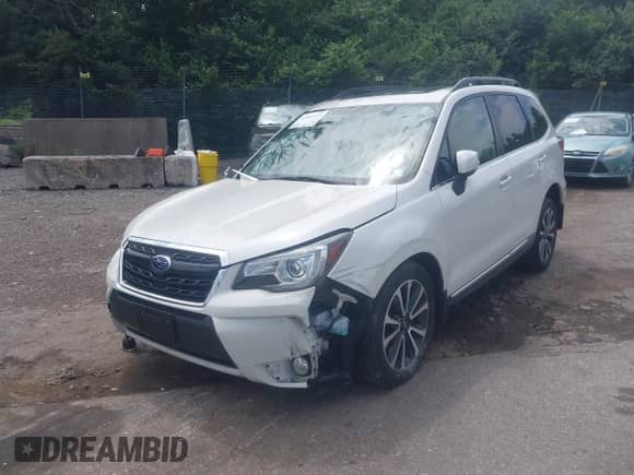 2018 Subaru Forester Touring z VIN JF2SJGWC3JH607000, wystawiony jako IAAI lot #42664722 z przebiegiem 30 857 mil mil oraz . Historia ofert i sprzedaży dostępna na DreamBid. Obrazek 19.