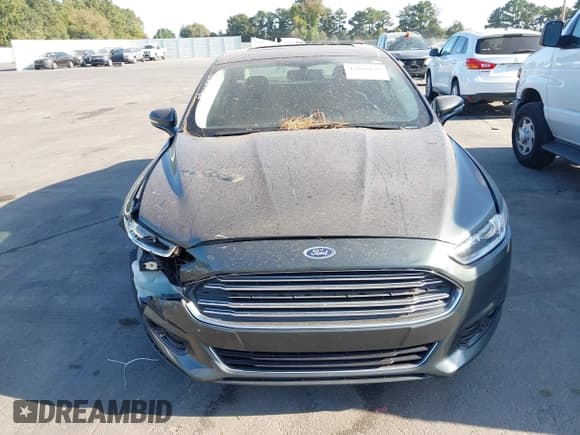 ✅ 2015 Ford Fusion Titanium • VIN: 3FA6P0SU8FR243611 • Lot: 43169838. Wystawiony na IAAI z przebiegiem 131 248 mil. Bezpłatny archiwum sprzedaży aukcyjnych z USA i szczegółowy raport historii pojazdu na DreamBid. Zdjęcie 12.