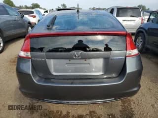 ✅ 2010 Honda Insight LX • VIN: JHMZE2H52AS019478 • Лот: 67657704. Опубликован ранее на Copart с пробегом 186 688 миль. Бесплатный доступ к архиву аукционных продаж из США и подробный отчёт об истории автомобиля на DreamBid. Изображение 6.