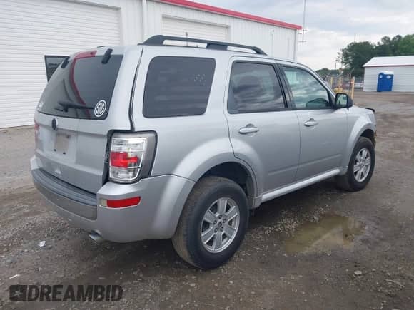 2010 Mercury Mariner with VIN 4M2CN8B76AKJ09411, listed as a IAAI auction lot 42386510 with 113,126 mi miles and . Bid and sale history available at DreamBid. Image 4.