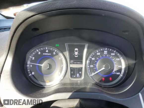 2013 Hyundai Azera z VIN KMHFH4JG7DA321468, wystawiony jako Copart lot #87069554 z przebiegiem 147 382 mil mil oraz Szkoda całkowita • Salvage title. Historia ofert i sprzedaży dostępna na DreamBid. Obrazek 9.