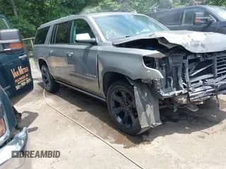 2017 Chevrolet Suburban Premier with VIN 1GNSKJKC6HR378919, listed as a IAAI auction lot 42594313 with 99,983 mi miles and . Bid and sale history available at DreamBid. Image 1.