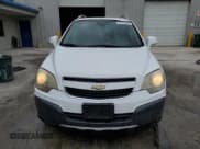 ✅ 2014 Chevrolet Captiva Sport LS • VIN: 3GNAL2EKXES606883 • Lot: 88721845. Wystawiony na Copart z przebiegiem 210 934 mil. Bezpłatny archiwum sprzedaży aukcyjnych z USA i szczegółowy raport historii pojazdu na DreamBid. Zdjęcie 5.