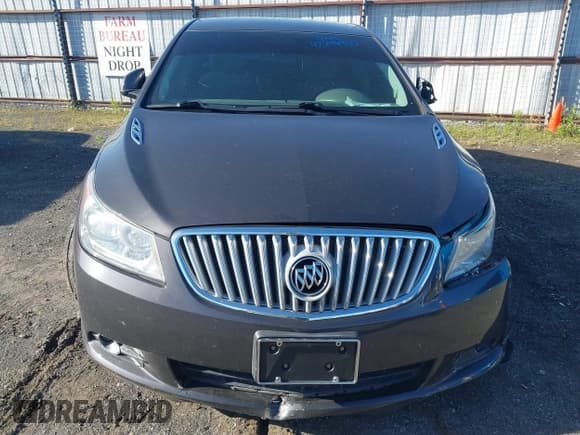 ✅ 2012 Buick LaCrosse Leather • VIN: 1G4GC5E33CF345073 • Lot: 42294945. Listed on IAAI with 104,805 mi. Free auction sales archive from the USA and detailed vehicle history report at DreamBid. Image 6.