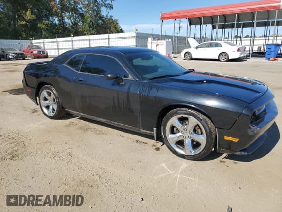 ✅ 2013 Dodge Challenger SXT • VIN: 2C3CDYAG0DH500287 • Lot: 76939094. Wystawiony na Copart z przebiegiem 220 127 mil. Bezpłatny archiwum sprzedaży aukcyjnych z USA i szczegółowy raport historii pojazdu na DreamBid. Zdjęcie 4.