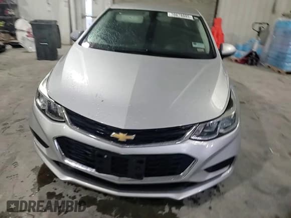 ✅ 2018 Chevrolet Cruze LS • VIN: 1G1BC5SM8J7122555 • Lot: 70678885. Listed on Copart with 101,938 mi. Free auction sales archive from the USA and detailed vehicle history report at DreamBid. Image 13.