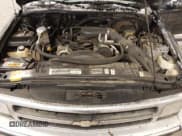 ✅ 1996 Chevrolet Blazer • VIN: 1GNDT13W2T2140730 • Lot: 41552544. Wystawiony na IAAI z przebiegiem 241 695 mil. Bezpłatny archiwum sprzedaży aukcyjnych z USA i szczegółowy raport historii pojazdu na DreamBid. Zdjęcie 10.