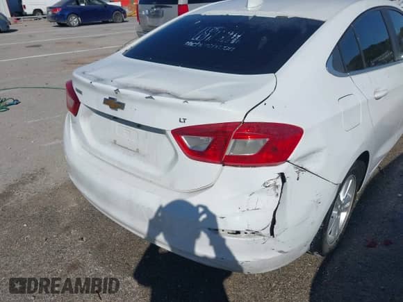 2016 Chevrolet Cruze LT with VIN 1G1BE5SM2G7271451, listed as a IAAI auction lot 43391114 with 228,784 mi miles and . Bid and sale history available at DreamBid. Image 13.