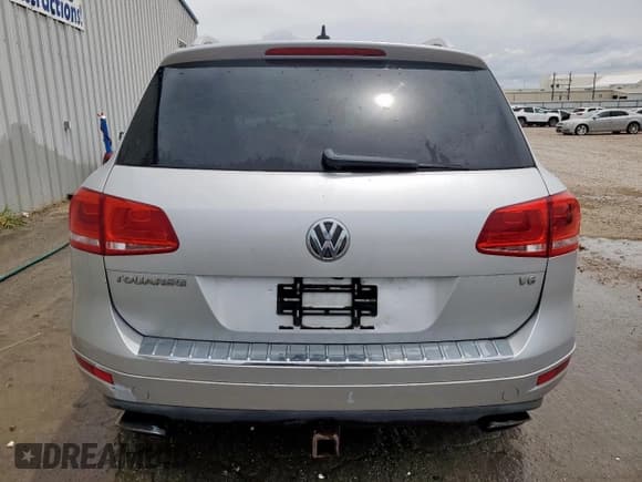 ✅ 2013 Volkswagen Touareg Exec • VIN: WVGEF9BP9DD011432 • Lot: 61800405. Listed on Copart with 187,342 mi. Free auction sales archive from the USA and detailed vehicle history report at DreamBid. Image 6.