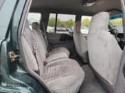 ✅ 1994 Jeep Grand Cherokee Laredo • VIN: 1J4GZ58S5RC195185 • Lot: 85191845. Listed on Copart with 67,415 mi. Free auction sales archive from the USA and detailed vehicle history report at DreamBid. Image 11.