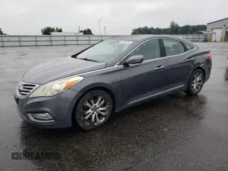 ✅ 2012 Hyundai Azera • VIN: KMHFG4JG2CA139985 • Лот: 67870295. Опубликован ранее на Copart с пробегом 172 977 миль. Бесплатный доступ к архиву аукционных продаж из США и подробный отчёт об истории автомобиля на DreamBid. Изображение 1.