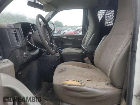 ✅ 2014 Chevrolet Express Cargo • VIN: 1GCWGFCG2E1183226 • Lot: 67111245. Listed on Copart with 181,401 mi. Free auction sales archive from the USA and detailed vehicle history report at DreamBid. Image 7.