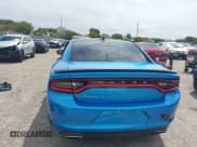 ✅ 2015 Dodge Charger SXT • VIN: 2C3CDXHG3FH827754 • Lot: 42012425. Listed on IAAI with 119,057 mi. Free auction sales archive from the USA and detailed vehicle history report at DreamBid. Image 16.