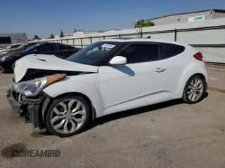 2013 Hyundai Veloster w/Black Int с VIN KMHTC6AD4DU147327, выставлен на аукционе Copart как лот 70406034 с пробегом 121 381 миль миль и Списание • Salvage title. История ставок и продаж доступна на DreamBid. Изображение 1.