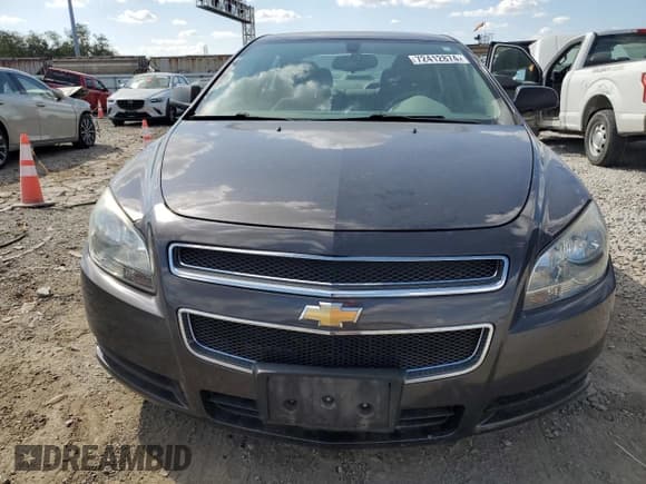✅ 2011 Chevrolet Malibu 1LS • VIN: 1G1ZB5E11BF203343 • Lot: 72412874. Listed on Copart with 121,674 mi. Free auction sales archive from the USA and detailed vehicle history report at DreamBid. Image 5.