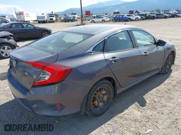 ✅ 2016 Honda Civic LX • VIN: 19XFC2F56GE097299 • Лот: 43205897. Опубликован ранее на IAAI с пробегом 105 917 миль. Бесплатный доступ к архиву аукционных продаж из США и подробный отчёт об истории автомобиля на DreamBid. Изображение 4.