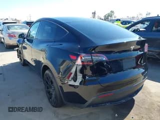 ✅ 2022 Tesla Model Y Long Range • VIN: 7SAYGDEE8NF346352 • Lot: 42649343. Listed on IAAI with 36,799 mi. Free auction sales archive from the USA and detailed vehicle history report at DreamBid. Image 3.