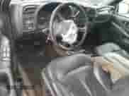 2000 Chevrolet Blazer LT z VIN 1GNCS13W4Y2165750, wystawiony jako Copart lot #78346644 z przebiegiem Nie podano mil oraz Szkoda całkowita • Salvage title. Historia ofert i sprzedaży dostępna na DreamBid. Obrazek 8.