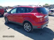 ✅ 2015 Ford Escape Titanium • VIN: 1FMCU0J93FUC89385 • Lot: 42328729. Listed on IAAI with 84,495 mi. Free auction sales archive from the USA and detailed vehicle history report at DreamBid. Image 3.